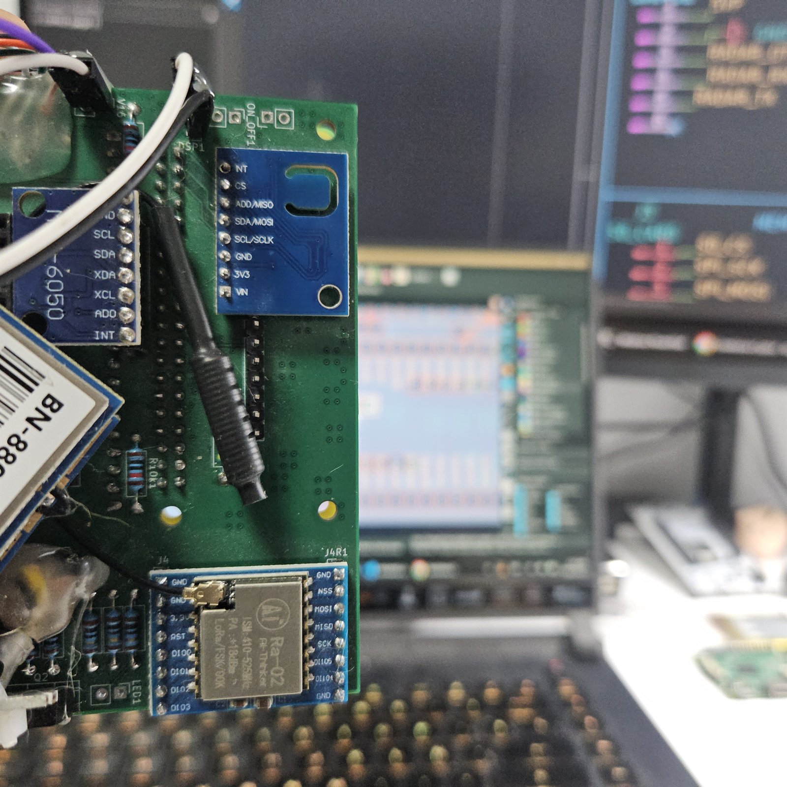 A circuit board carrying a BN-880 satellite navigation module, an MPU6050 motion sensor and a LoRa radio module